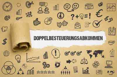 Schriftzug Doppelbesteuerungsabkommen - © magele-picture - stock.adobe.com